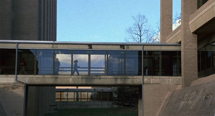 IMAGE: Still - Foster alone walking through HQ